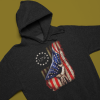 heathered-hoodie-mockup-lying-over-colorful-pasteboards-24729